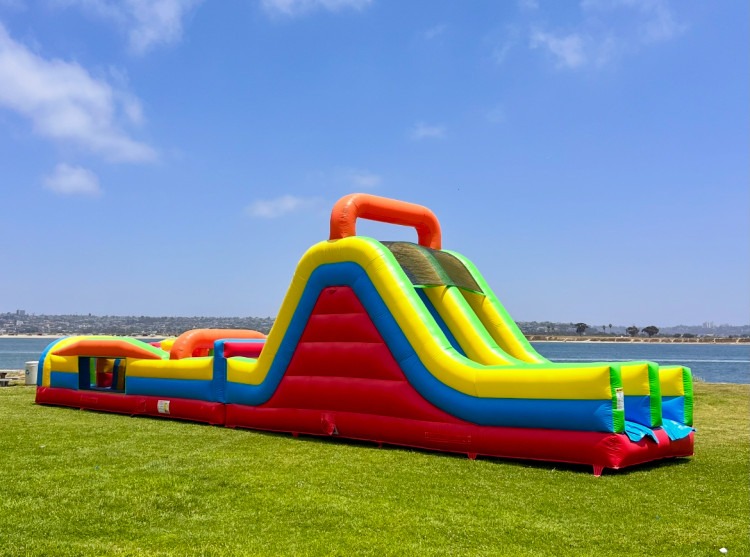 Rainbow 56' Inflatable Obstacle Course with Dual Lane Slide Rainbow 56' Inflatable Obstacle Course with Dual Lane Slide